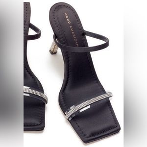 GOOD AMERICAN WOMEN'S KICKSTAND HIGH HEEL SLIDE SANDALS IN SATIN BLACK001